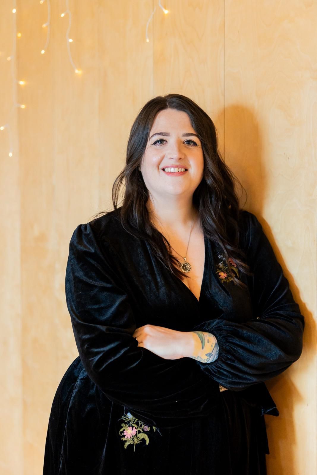 Hannah Wild seated by a window